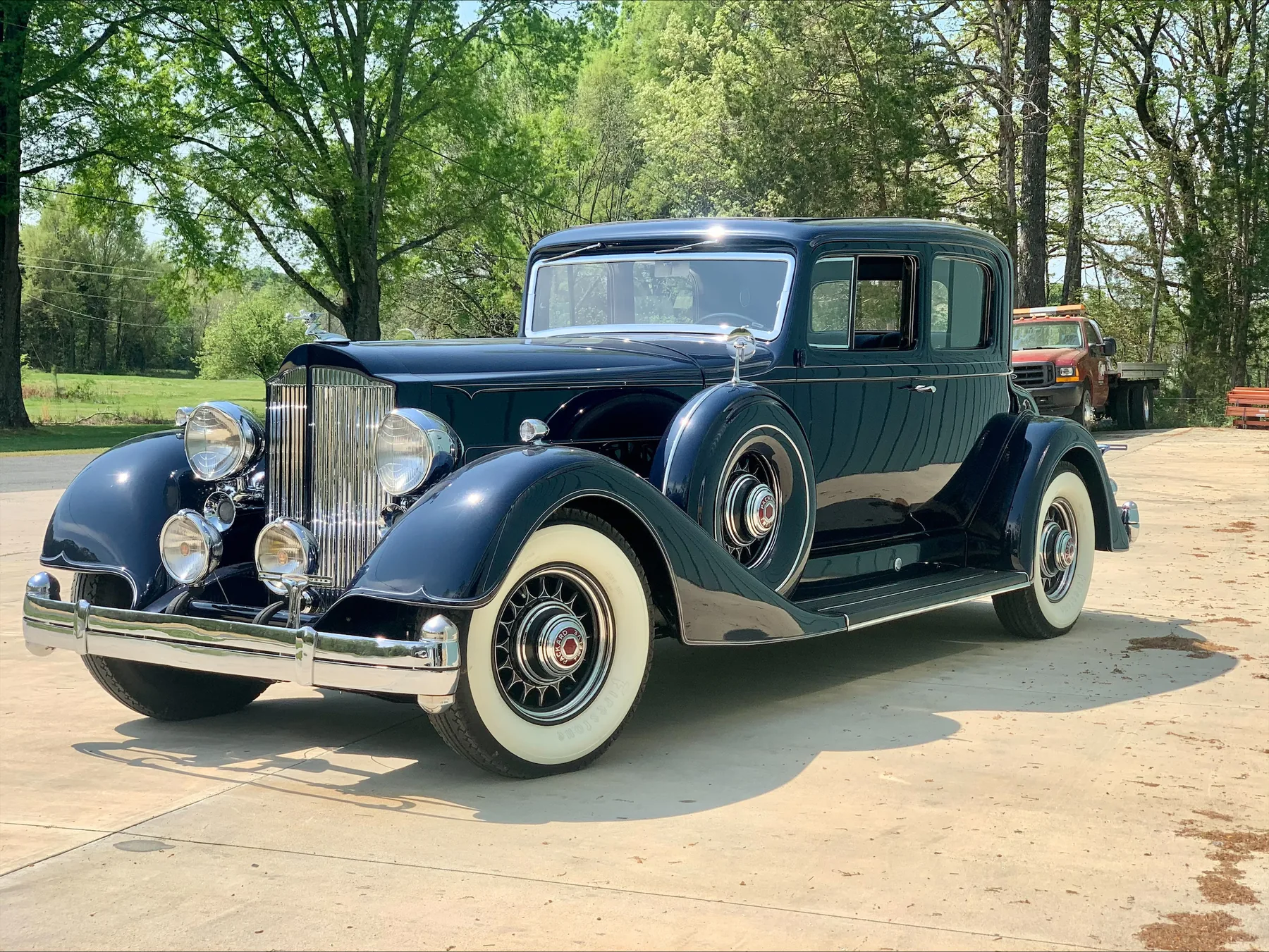 Blue vintage formal sedan photographed outdoors